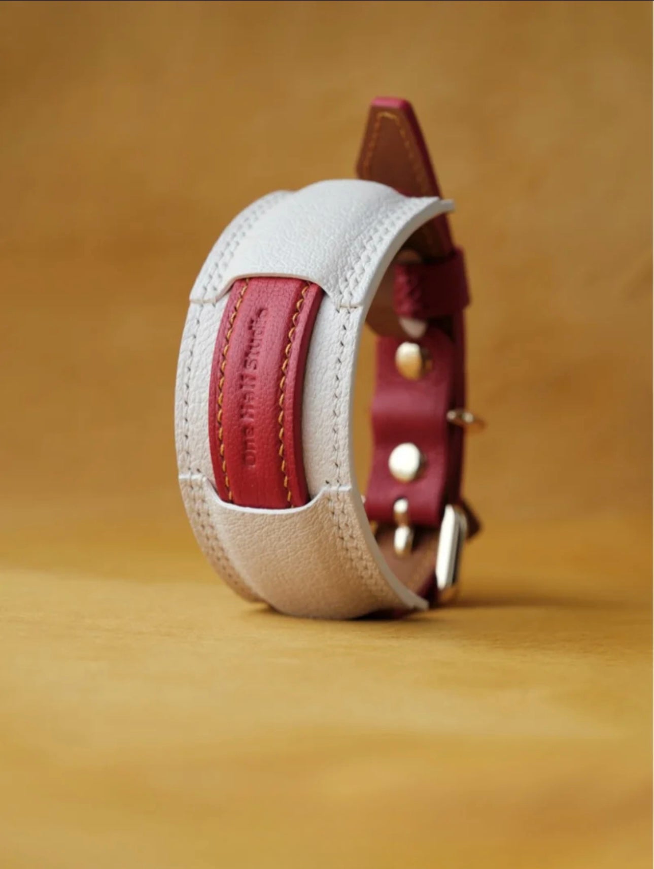 Luxury handmade leather dog collars in hermes leather, featuring a designer style for small to large dogs